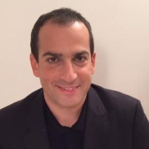 headshot of Gregory Dray